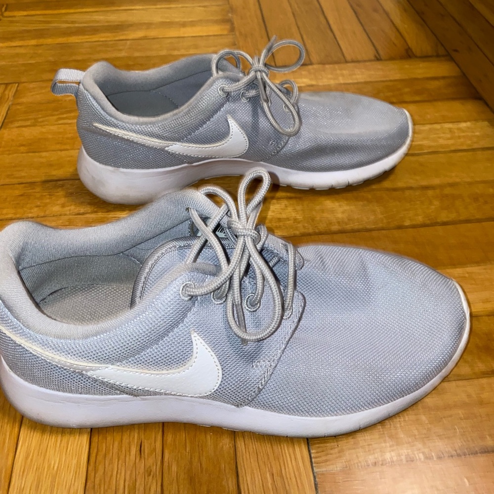 Gray Nike Free runs